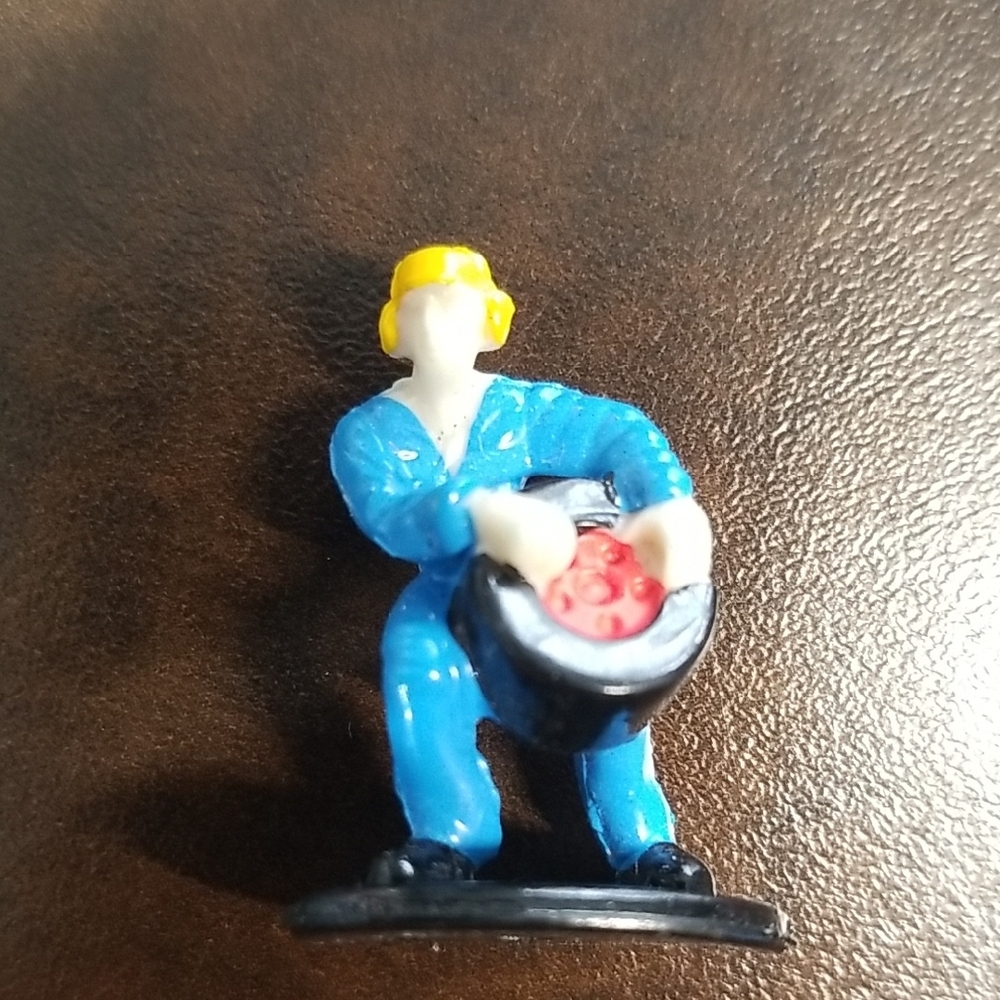 Blue and Yellow Toy Figure